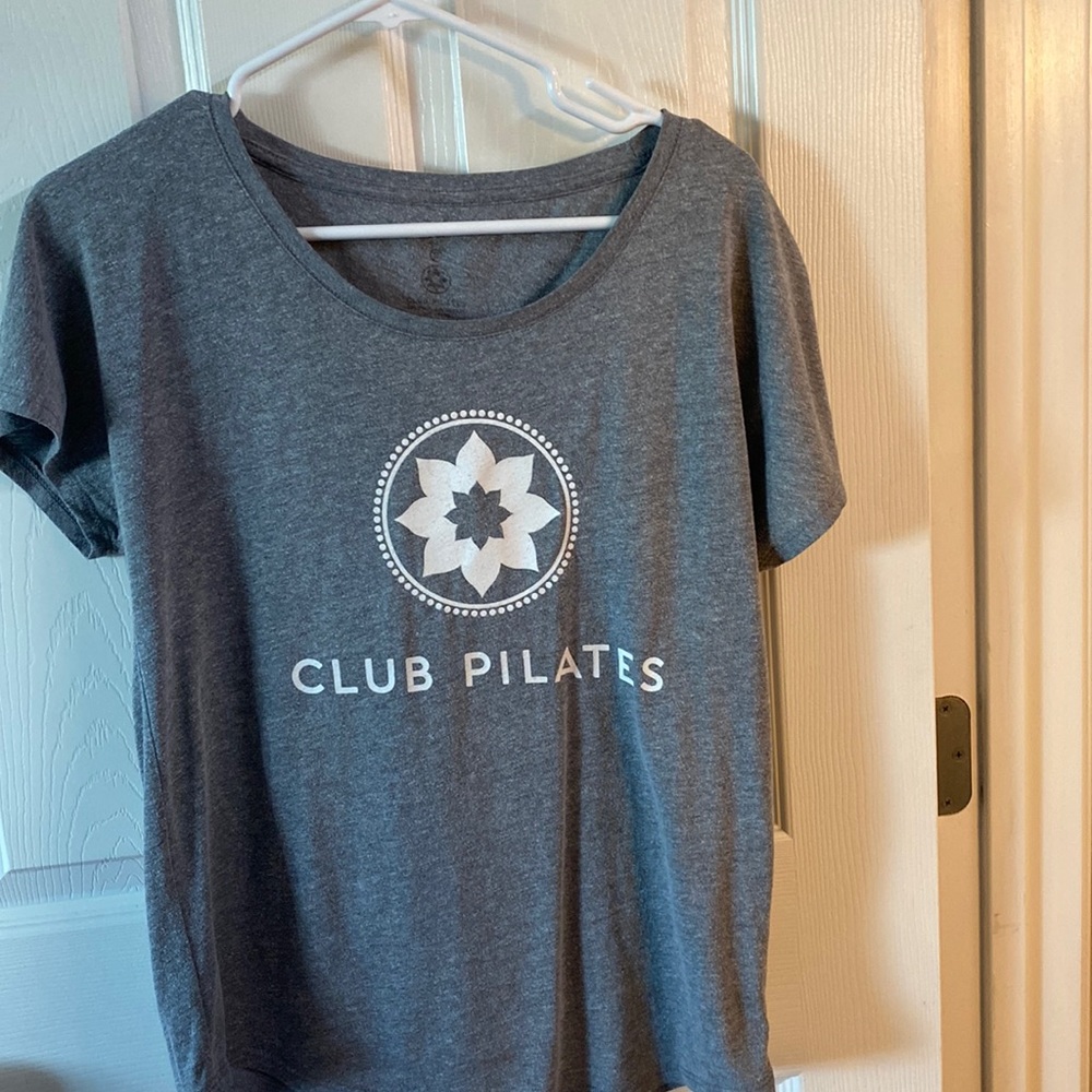 Club Pilates tee shirt.